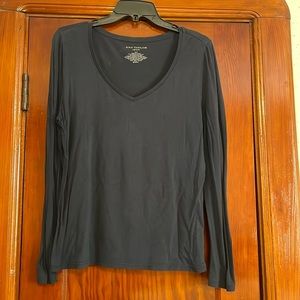 Navy blue long sleeve T shirt.